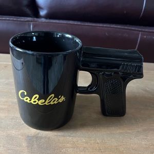 Cabela’s pistol grip coffee mug.excellent condition